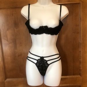 Sexy black “shelf bra” and g-string panty